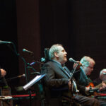 Joe Coughlin Jazz Vocalist singing on stage