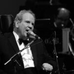Black and White photo of Canadian Vocalist Jazz Singer Joe Coughlin with his show 'Live at the Sands'